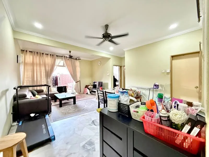 Living features: marble flooring, cream painted walls, 5-blade ceiling fan with light, floor-to-ceiling windows, sheer curtains, sofa in dark color, coffee table, area rug, TV console, wall-mounted TV, decorative items on shelves; style: modern. Room features: wooden storage cabinet, exercise treadmill, decorative plants, various containers with items.