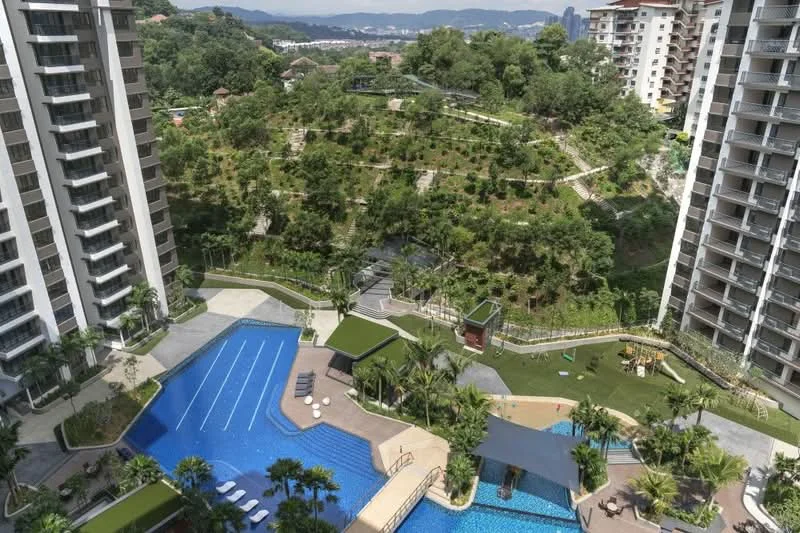 Exterior type: high-rise condominium; features: infinity pool, lap pool, pool deck with loungers, landscaped garden, children's playground, jogging track, mature trees, surrounded by greenery; style: modern.