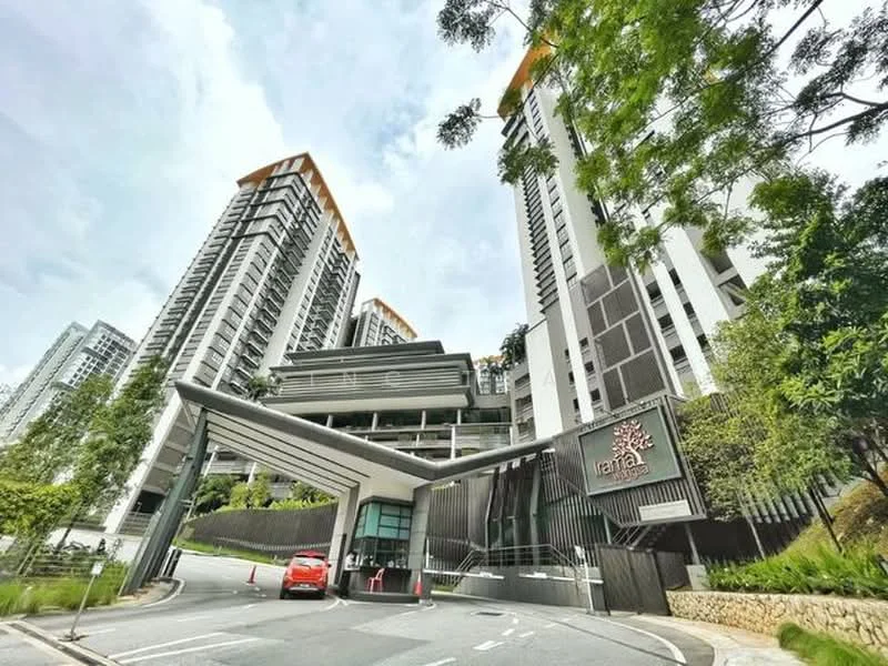 Exterior type: high-rise condominium; features: glass curtain wall, white painted facade, recessed balconies, landscaped entrance, guard house at entrance, driveway with interlocking pavers, surrounded by mature greenery, multi-storey car park; style: modern.