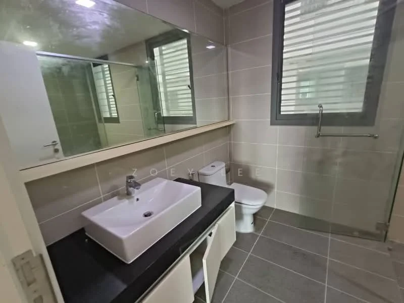 Bathroom features: white ceramic sink, chrome basin mixer faucet, black countertop, white one-piece toilet, glass shower enclosure, grey tile flooring, grey wall tiles, large mirror above sink, window with horizontal slats; style: modern.