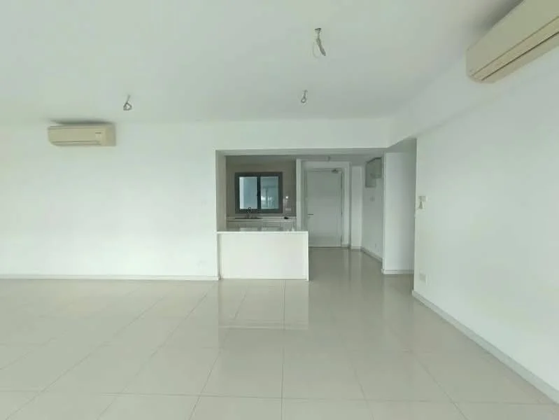 Living features: white painted walls, glossy ceramic tile flooring, recessed downlights, 1 wall-mounted split AC, large window, open layout to kitchen, neutral color scheme, no visible furniture; style: modern. Kitchen features: white cabinetry, countertop, open layout to living area, no visible appliances; style: modern.