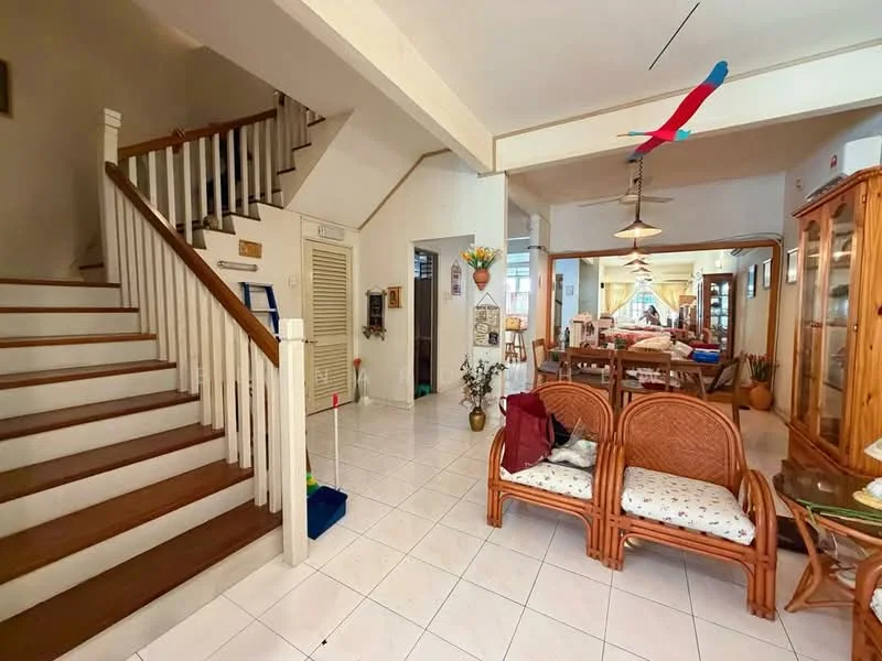 Living features: white painted walls, ceramic tile flooring, wooden staircase, 2-seater rattan sofa, decorative wall art, hanging pendant lights, open layout to dining area, large windows for natural light, potted plants, wooden furniture, ceiling fan; style: traditional.
