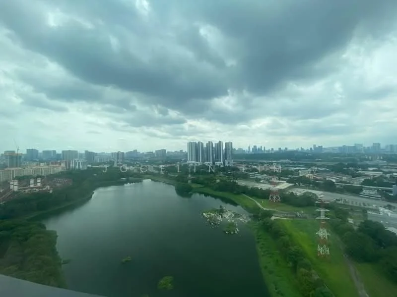 Exterior features: city skyline, water body, greenery, cloudy sky, high-rise buildings in distance, power lines.