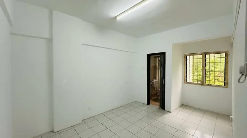 Room features: white painted walls, tile flooring, window with grille, fluorescent ceiling lights, corner room, doorway leading to bathroom, natural light from window; view: garden.