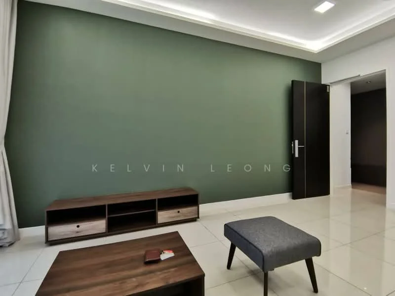 Living features: green accent wall, white painted walls, glossy white tile flooring, recessed ceiling lights, wooden TV console with drawers, grey upholstered ottoman, open doorway, neutral decor; style: modern.