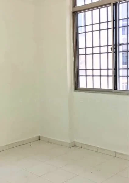 Room features: white painted walls, tile flooring, large window with metal grille, natural light from window.