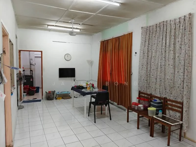 Room features: white painted walls, tiled flooring, ceiling fan, curtains in orange and floral patterns, wall-mounted TV, dining table with chairs, plastic containers on table, wooden chairs, open space layout; style: minimalist.
