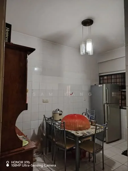 Kitchen features: white tiled walls, ceramic tile flooring, recessed downlights, pendant light fixture, stainless-steel fridge, wooden dining table, four metal dining chairs, decorative fruit bowl, kitchen cabinetry, countertop with appliances; style: modern.