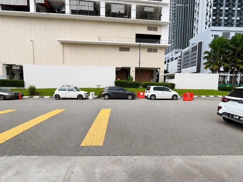 Exterior features: manicured lawn, palm trees, concrete facade, parking lot, road with yellow markings, surrounding high-rise buildings; style: modern.