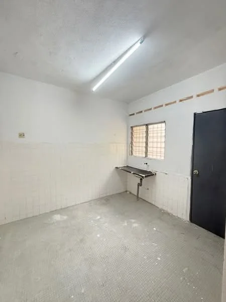 Room features: white painted walls, tile flooring, single window with grid, sink with faucet, fluorescent ceiling light, plain ceiling, no visible furniture, empty space; style: minimalist.