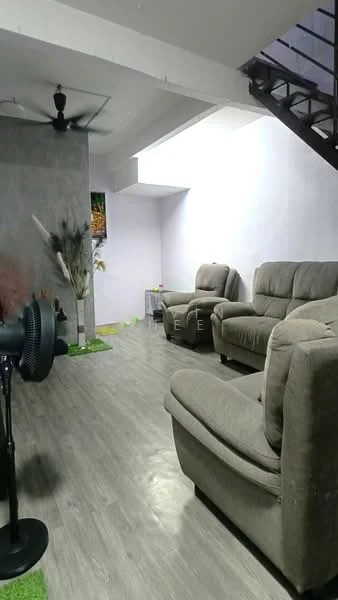 Living features: grey fabric reclining sofa, 2-seater sofa, 3-seater sofa, ceiling fan, laminate flooring, light purple painted walls, decorative plants, green grass mat, staircase visible in background; style: modern.