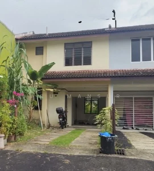 Exterior type: linked terrace house; features: two-storey building, cream painted facade, grey painted facade, red tiled roof, paved driveway, garden area with plants, motorcycle parked in driveway, window grilles, front yard with grass, fence surrounding property; style: modern.