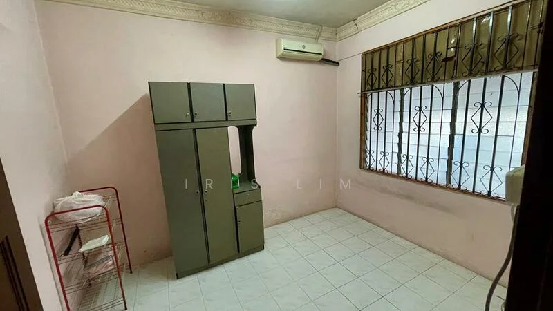 Room features: pink painted walls, white tiled flooring, 1 wall-mounted split AC, window with metal grille, built-in wardrobe in green, metal shelving unit, ceiling with crown moulding.