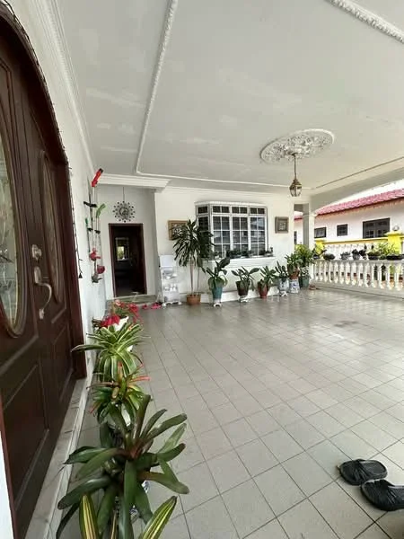 Exterior type: detached bungalow; features: tiled flooring, white painted walls, decorative ceiling with chandelier, large front door with glass panels, window with grid design, potted plants along the entrance, covered porch area, railings with decorative design; style: traditional.