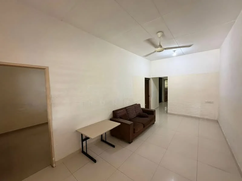 Living features: white painted walls, plain ceiling, ceiling fan, tile flooring, brown fabric sofa, small rectangular table, doorway to adjacent rooms; style: minimalist.