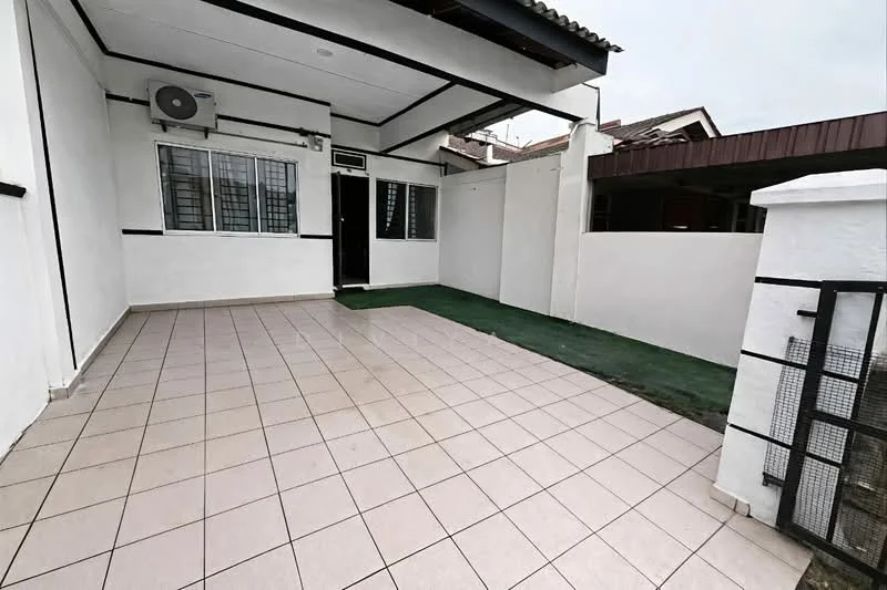 Exterior type: linked terrace house; features: tiled flooring, white painted walls, air conditioning unit, sliding window with security bars, green grass area, covered porch, fenced boundary, roof overhang; style: modern.