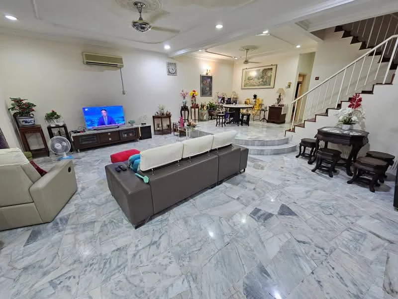 Living features: marble flooring, cream painted walls, 5-blade ceiling fan with light, wall-mounted TV, sofa with beige upholstery, coffee table, decorative plants, side tables, air conditioning unit, artwork on wall, dining area visible in background, staircase leading to upper floor; style: modern.