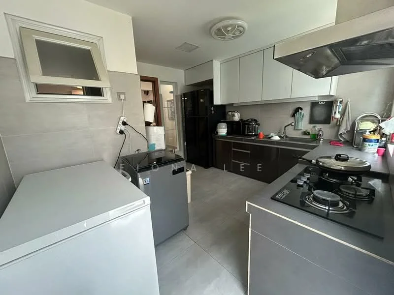 Kitchen features: grey cabinetry, white countertops, stainless-steel gas hob, built-in range hood, double-door fridge, microwave, kettle, black sink, wall-mounted cabinets, tile backsplash, grey tile flooring, recessed ceiling lights, window with sheer curtains; style: modern.