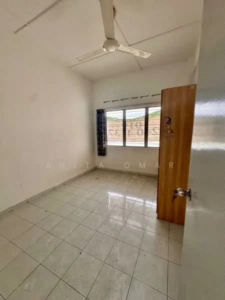 Room features: white painted walls, glossy tile flooring, ceiling fan, window with curtains, wooden door, natural light from window, corner of room with no furniture.