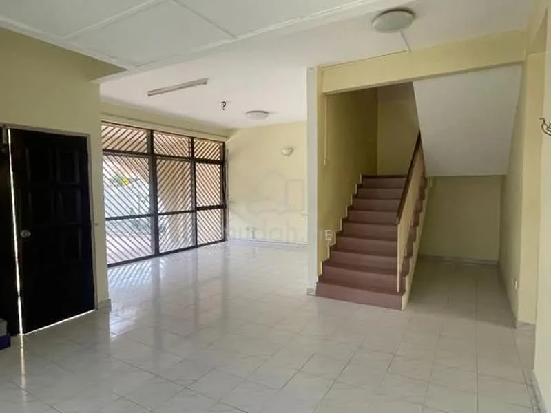 Room features: white painted walls, tile flooring, staircase with beige steps, large windows with metal grilles, ceiling lights, open layout, corner space, natural light; style: modern.