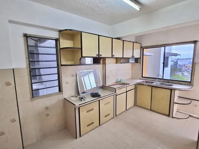 Kitchen features: yellow cabinetry with black trim, laminate countertop, single-bowl stainless-steel sink, chrome faucet, wall-mounted window with metal grille, tile backsplash, cream tiled walls, light-colored tiled flooring, fluorescent ceiling light.