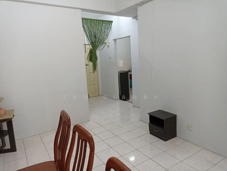 Room features: white painted walls, white tiled flooring, doorway leading to another room, green curtain, small black cabinet, wooden dining chairs, table, open layout; style: modern.