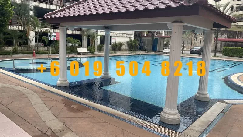 Exterior type: swimming pool deck; features: infinity pool, pool deck with loungers, covered pavilion with columns, tiled flooring, landscaped greenery, surrounding palm trees, poolside lighting, water feature, safety railing, pool tiles in blue, seating area, paved walkway; style: modern.