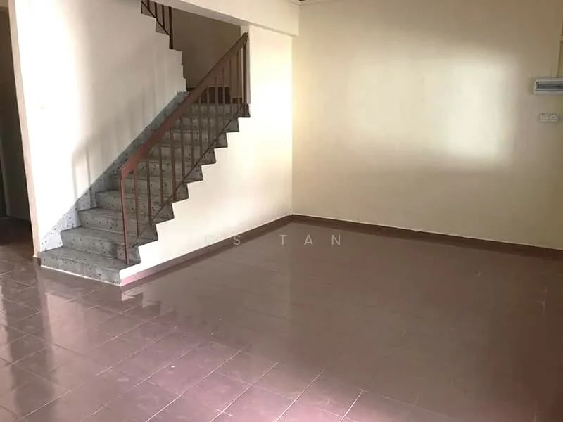 Room features: staircase with metal railing, cream painted walls, brown tiled flooring, wall-mounted air conditioning unit, large empty space, natural light from window, no visible furniture; style: minimalist.