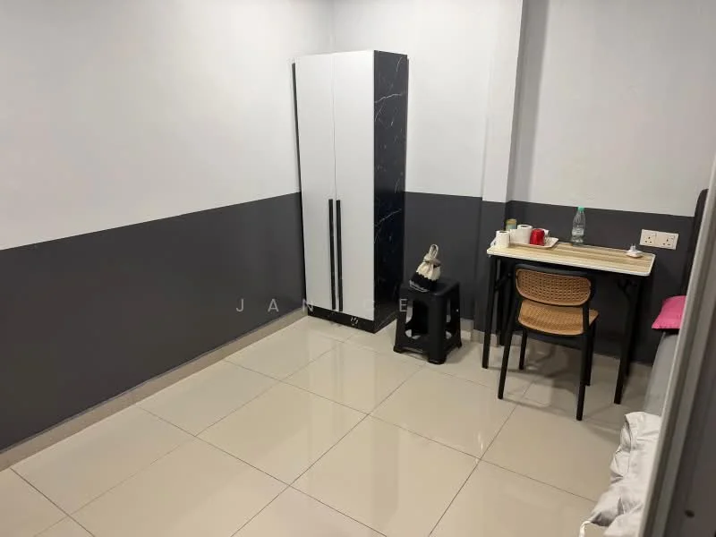 Room features: grey painted walls, white painted walls, glossy tile flooring, black and white wardrobe, small dining table, wooden chair, black stool, bottle of water on table, bed with white bedding; style: modern.