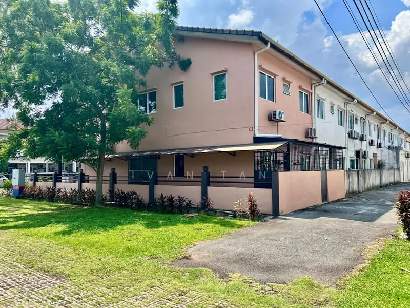 Exterior type: linked terrace house; features: pink painted facade, single-storey, manicured lawn, mature trees, covered car porch, perimeter fence, air conditioning units visible, driveway with interlocking pavers; style: modern.