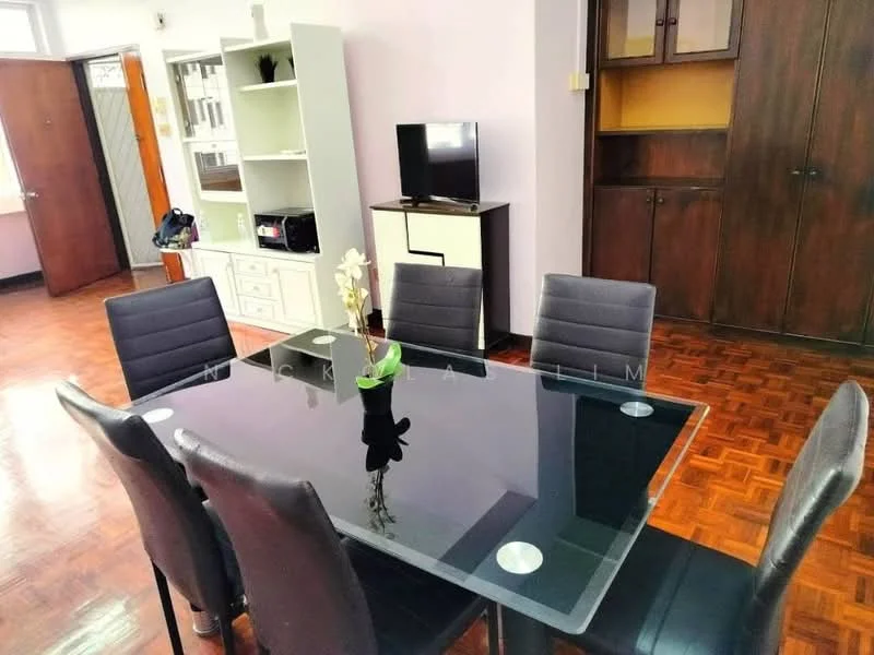 Dining features: 6-seater dining table with glass top, black leather dining chairs, wooden flooring, wall-mounted TV, white shelving unit, dark wood cabinetry, decorative plant on table, light purple painted walls; style: modern.