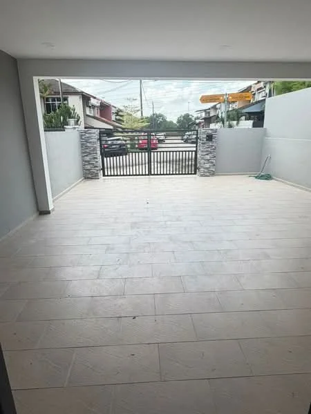 Exterior features: paved flooring, stone-clad feature wall, metal gate, surrounding walls, outdoor space, street view, overhead lighting; style: modern.