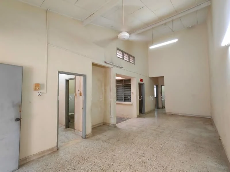 Room features: white painted walls, concrete flooring, exposed ceiling with fluorescent lighting, ceiling fan, multiple doorways, large windows, neutral color scheme, high ceiling; style: minimalist.