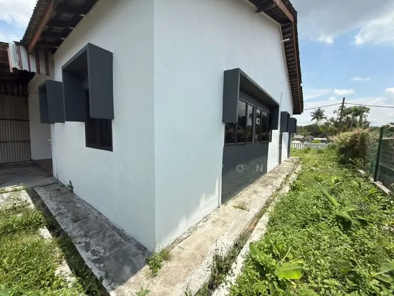 Exterior features: white painted facade, grey window shutters, flat roof, concrete pathway, overgrown grass, landscaping with plants; style: modern.