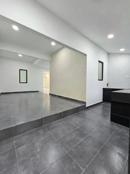 Room features: grey tiled flooring, white painted walls, recessed ceiling lights, two small windows, open layout, step-up area, kitchen cabinetry visible, neutral color scheme; style: modern.