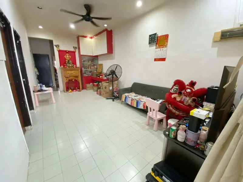 Living features: white painted walls, tile flooring, ceiling fan, sofa in grey, coffee table, wall-mounted TV, decorative wall calendar, Chinese lion dance decoration, storage boxes, small pink chairs, black TV console, wall-mounted shelf.
