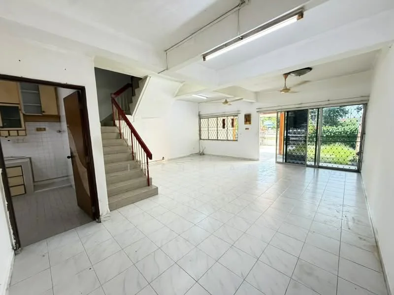 Living features: white painted walls, tile flooring, ceiling fan, 2 ceiling lights, sliding glass door, grill door, staircase, open layout; view: garden. Kitchen features: white cabinetry, countertop, sink, stove, tile backsplash.