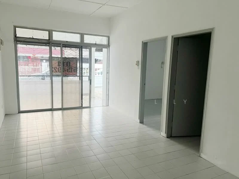 Room features: white painted walls, white tiled flooring, large glass sliding door, multiple doorways, natural light from windows, open layout, no visible furniture, plain ceiling; style: minimalist; view: street.