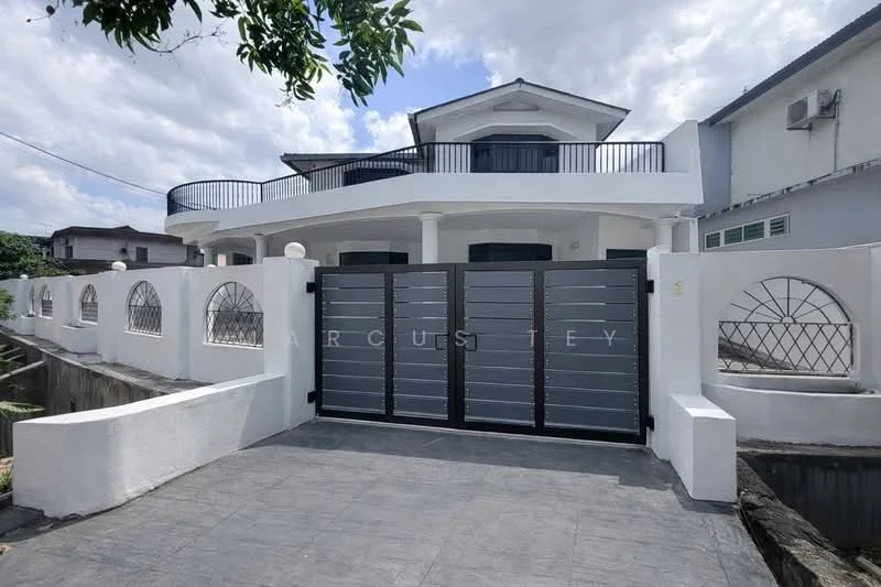 Exterior type: detached bungalow; features: white painted facade, flat roof, double-storey, manicured lawn, paved driveway, metal gate, arched windows, balcony with railing, exterior wall with decorative pattern, air conditioning unit visible; style: modern.