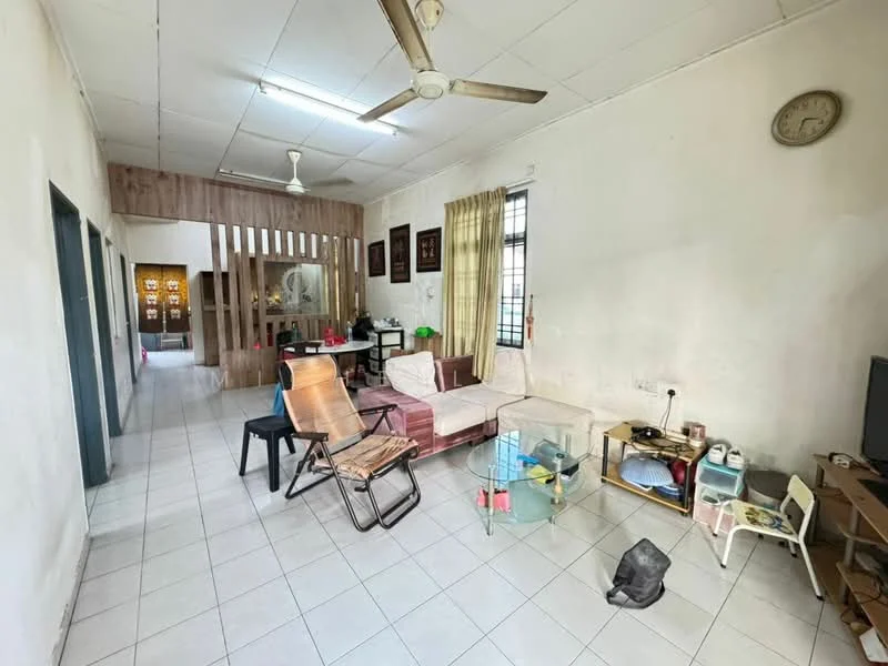 Living features: white painted walls, tiled flooring, ceiling fan, 3-seater fabric sofa in light color, armchair, glass coffee table, TV console, wall-mounted TV, decorative wall clock, curtains, open layout, partition wall with wooden slats, area rug; style: minimalist. Room features: doorway leading to other rooms, light fixtures, dining table visible in background.