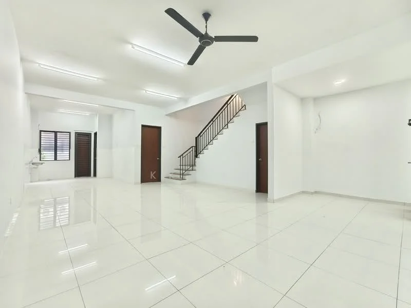 Living features: white painted walls, glossy white floor tiles, 5-blade ceiling fan, recessed LED downlights, open layout, staircase leading to upper floor, large windows, doorways leading to other rooms; style: modern. Kitchen features: white painted walls, glossy white floor tiles, kitchen sink, counter space, cabinets, doorway leading to living area; style: modern.