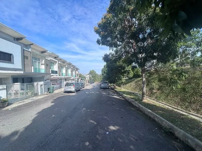 Exterior type: linked terrace house; features: two-storey linked terrace houses, paved road, manicured greenery, trees lining the street, parking spaces visible, clear blue sky; style: modern.