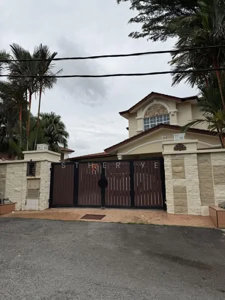 Exterior type: detached bungalow; features: two-storey building, brown wooden gate, stone cladding on facade, arched window above entrance, manicured landscaping, palm trees in vicinity, driveway with interlocking pavers, decorative stone wall, gated entry, front porch area; style: modern.