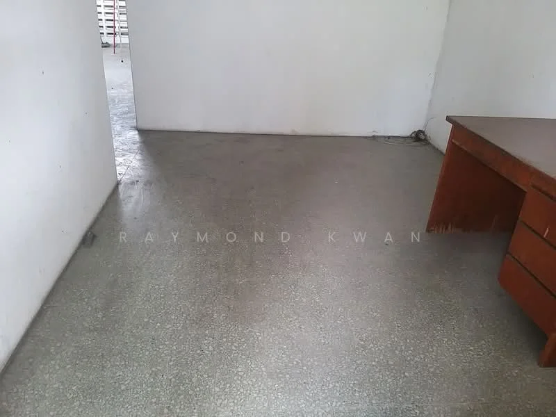 Room features: grey polished concrete flooring, white painted walls, wooden desk, minimal furniture; style: minimalist.
