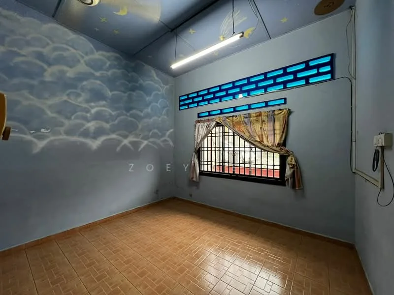 Room features: blue painted walls with cloud mural, tile flooring, window with black grille, curtains with floral pattern, ceiling with painted stars and moon, light fixture on ceiling, electrical outlet on wall.