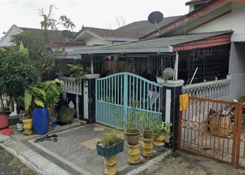 Exterior type: semi-detached house; features: blue metal gate, concrete pathway, potted plants, tropical landscaping, satellite dishes, covered porch, fenced yard, manicured lawn; style: traditional.