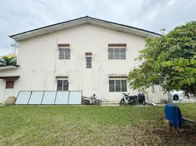 Exterior type: detached bungalow; features: white painted facade, two-storey building, multiple windows with metal grilles, grass lawn, mature tree, motorcycles parked, water tank, solar panels, concrete pathway; style: traditional.