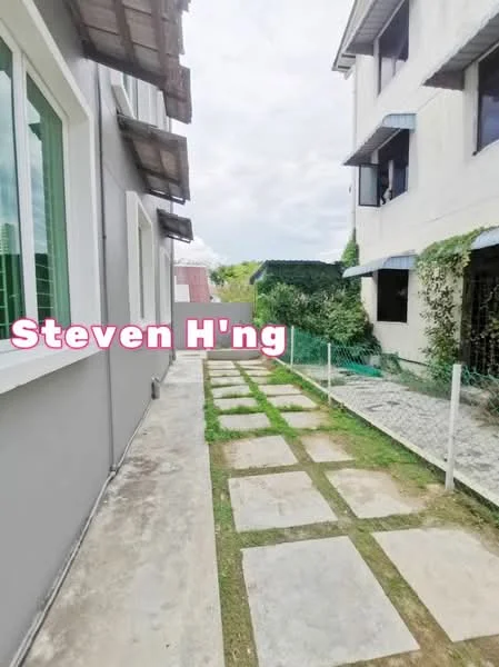 Exterior features: paved walkway with stone slabs, greenery along the side, two-storey building, windows with awnings, fence along the pathway, garden area visible; style: modern.