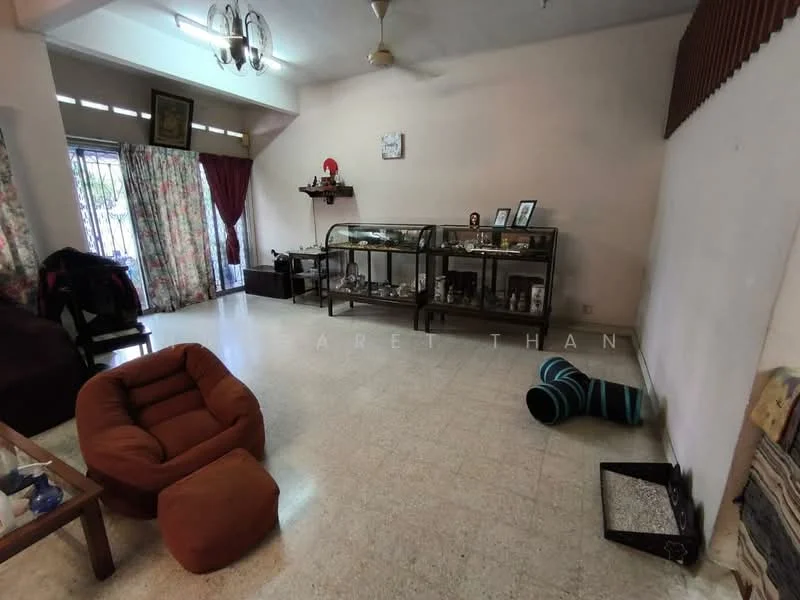 Living features: cream tiled flooring, white painted walls, large window with metal grille, red curtains, wooden display cabinet, brown fabric sofa, bean bag chair in orange, blue and black striped cat bed, decorative items on display, area rug, ceiling light fixture; style: traditional.
