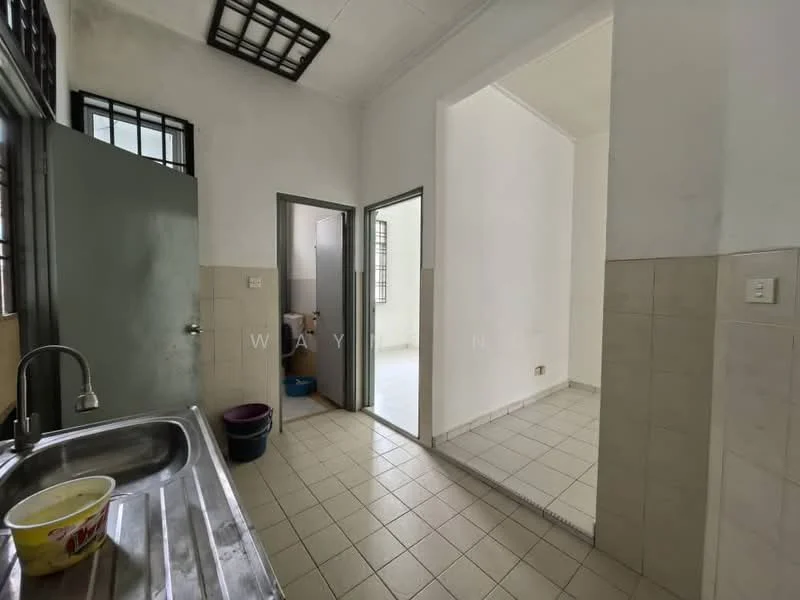Kitchen features: stainless-steel sink, single-bowl sink, chrome faucet, grey cabinetry, tile backsplash, white tiled walls, light grey floor tiles, window with security bars, open layout, doorway to adjacent room. Room features: white walls, light grey floor tiles, doorway leading to another room, window with security bars.